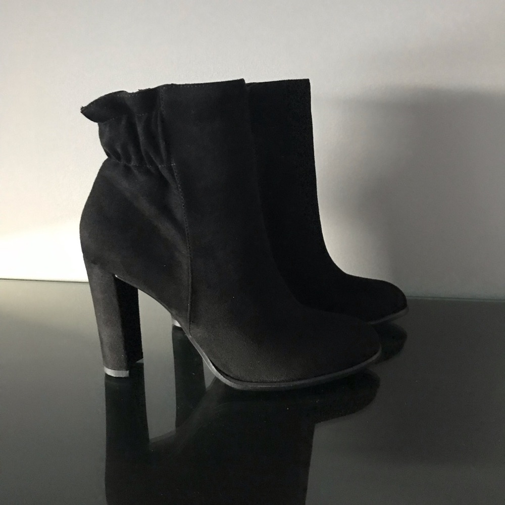 Black suede booties.